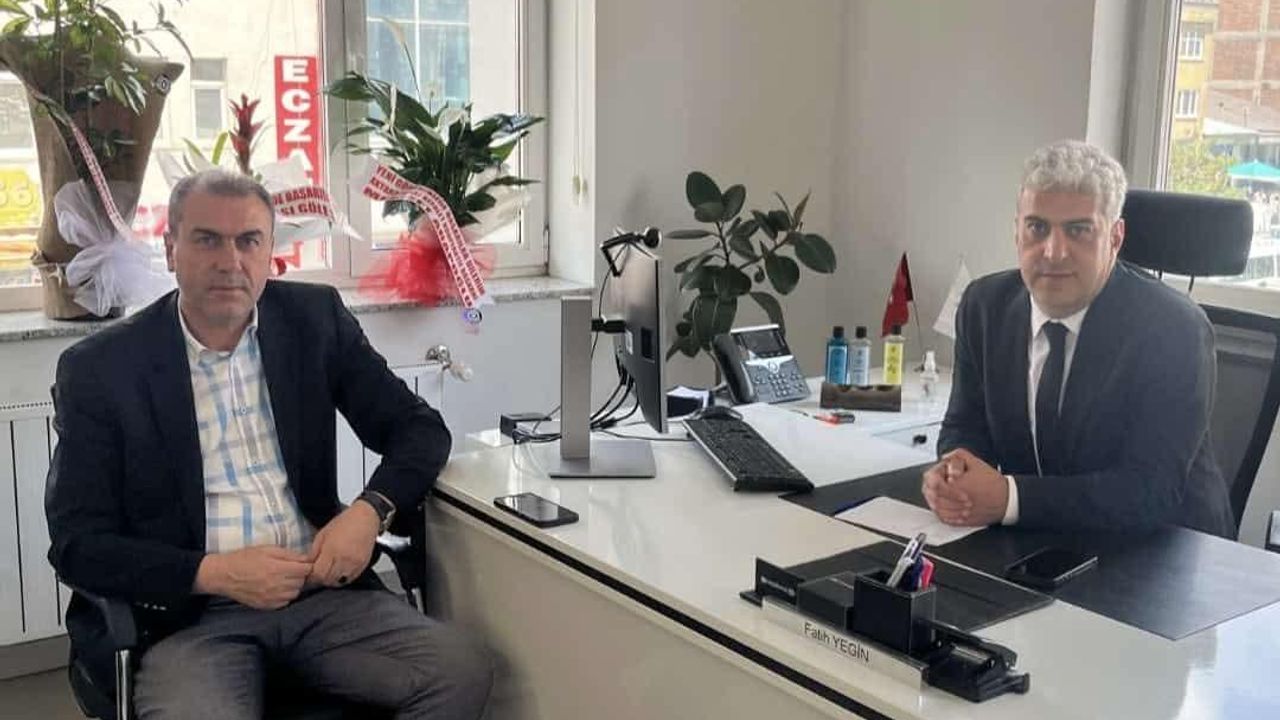 Kars Esnaf Kooperatifi Başkanı Yeni Halkbank Müdürünü Ziyaret Etti