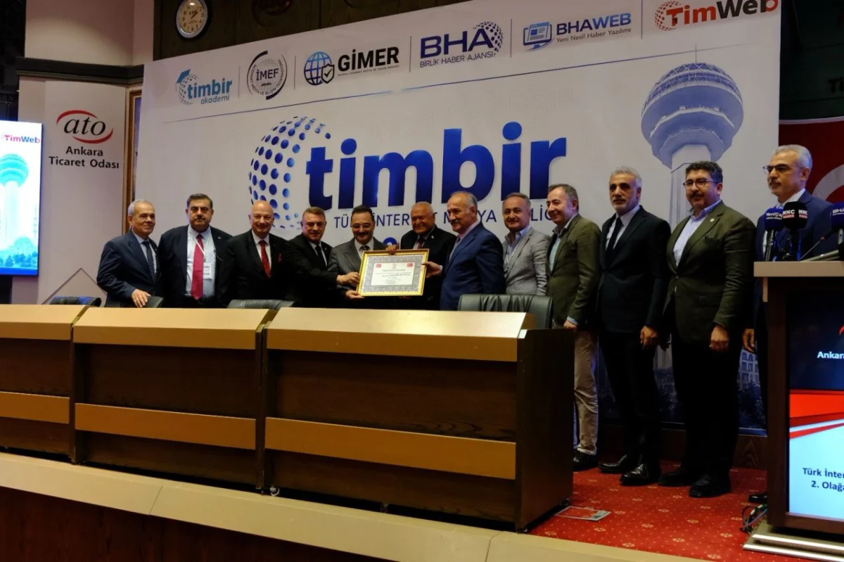 TİMBİR Başkanı Dr. Süleyman Basa’ya üstün hizmet beratı verildi